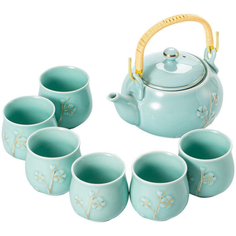 Service à thé  1 théière  et 6 tasses en céramique